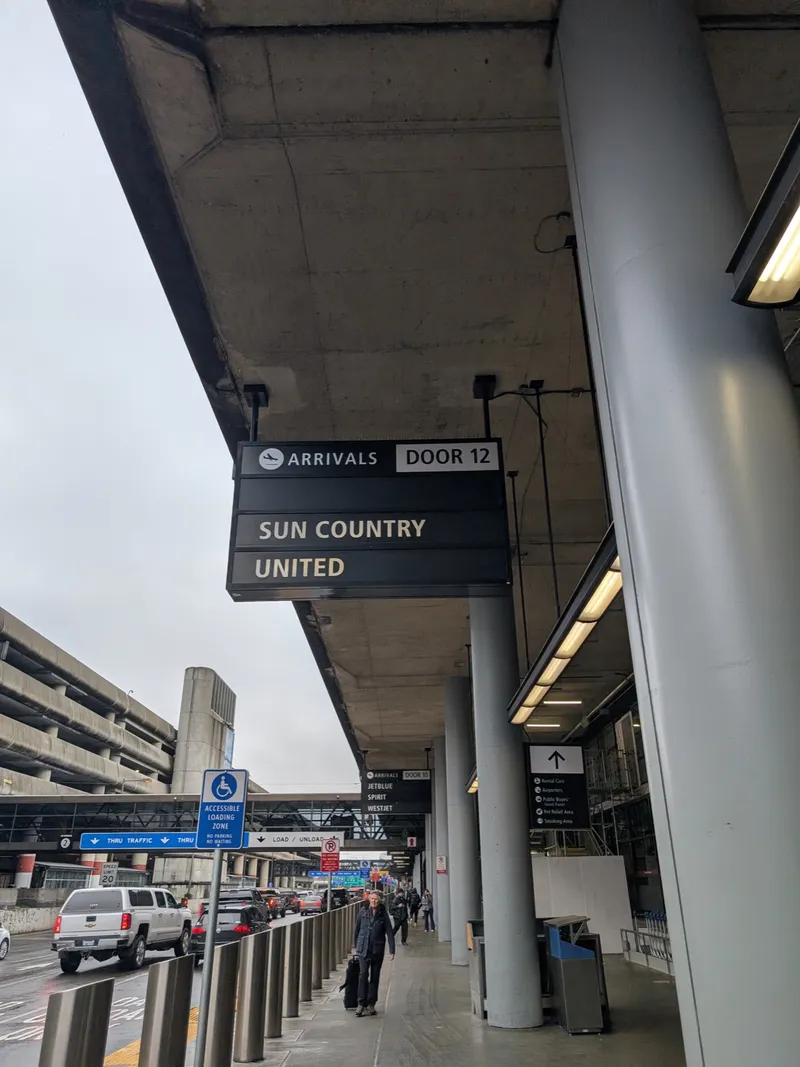 SeaTac Airport arrivals curbside pickup area