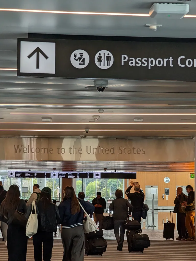 Passengers arriving at SeaTac Airport passport control